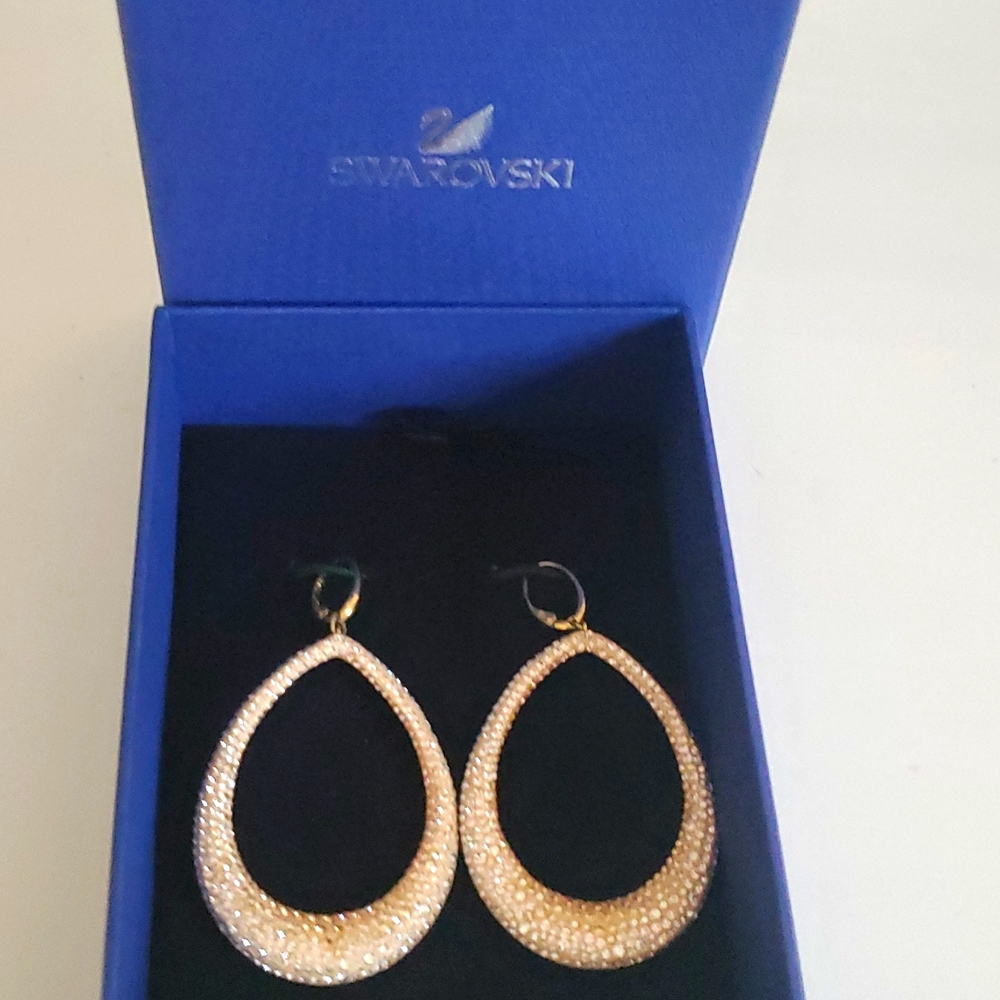 Swarovski abstract long earrings.